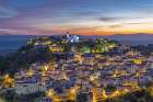 Casares, Malaga, Andalusia, Spain. Evening view of the village of Casares. Art Print